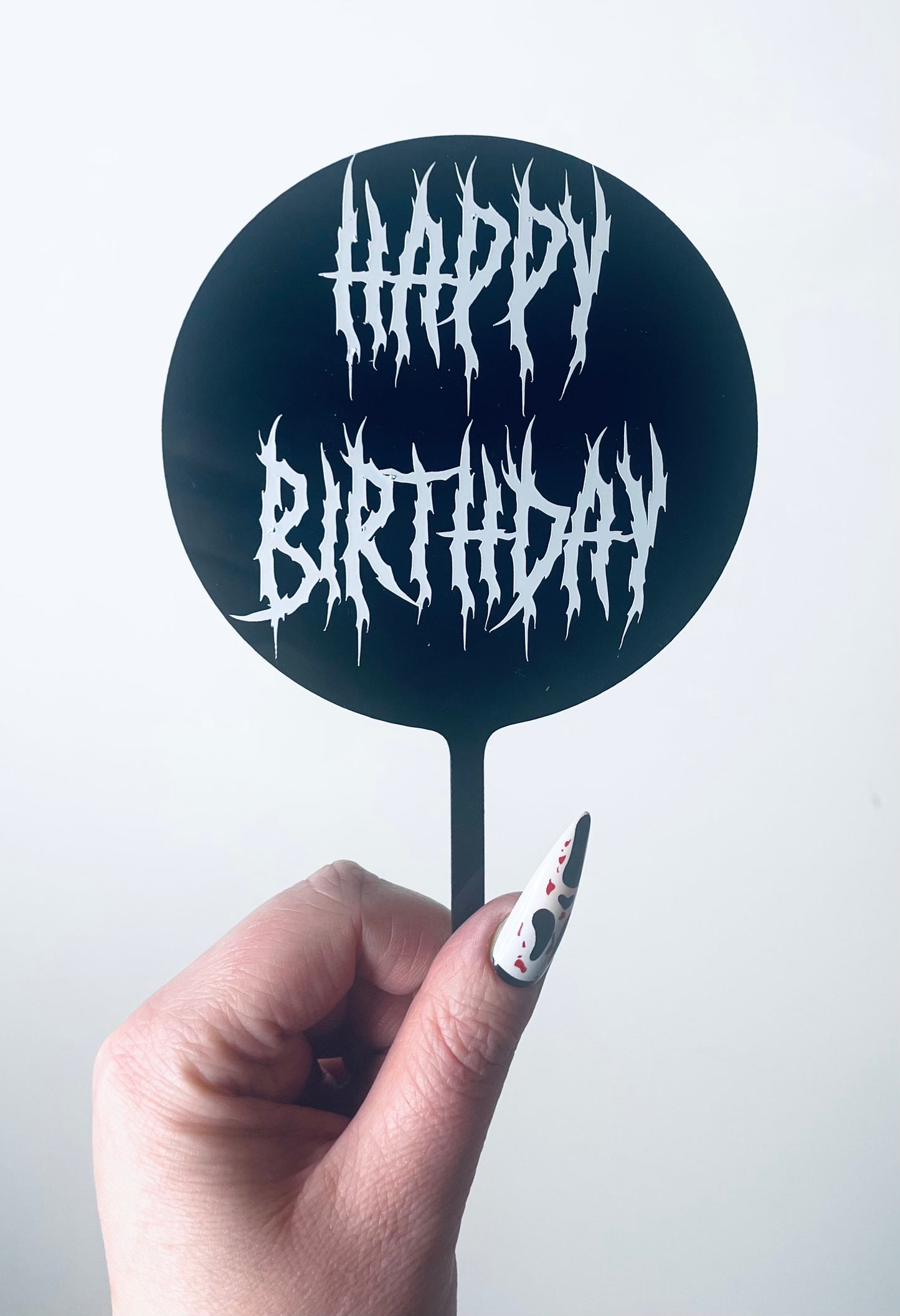 Death metal birthday cake topper